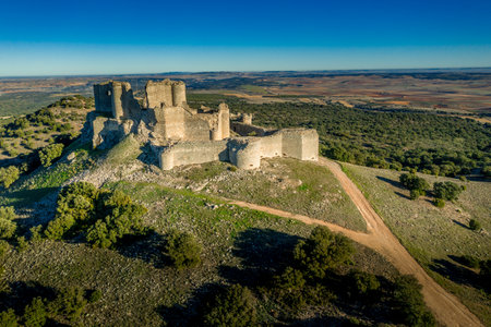 Aerial view of medieval castle ruin Pueble de Almenara in Cuenca Spain with concentric walls, semicircular towers and angle bastionsの写真素材