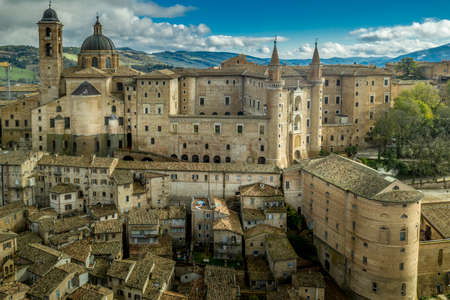 Aerial panorama of the Ducal Palace of Urbino medieval walled town and university in Marche, Italy a popular travel destinationのeditorial素材