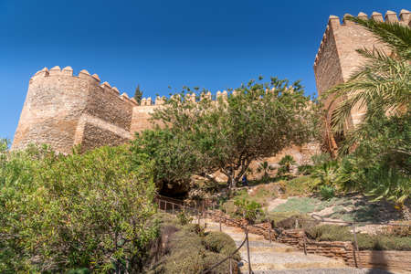 Almeria medieval castle panorama with blue sky circular towers, loopholes, medieval garden in Andalusia Spain former Arab strongholdのeditorial素材
