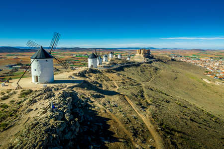Consuegra castle and windmills aerial view with blue sky in La Mancha Spain famous Don Quixote siteのeditorial素材