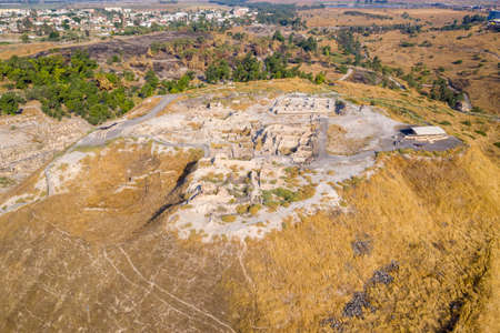 Aerial view of ancient Beit Shean ruins of a Roman Byzantine era settlement in Israel with blue sky