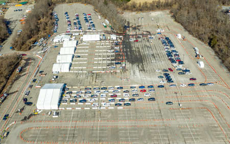Aerial view of   virus  vaccination drive through supersite Maryland providing mass immunization,...