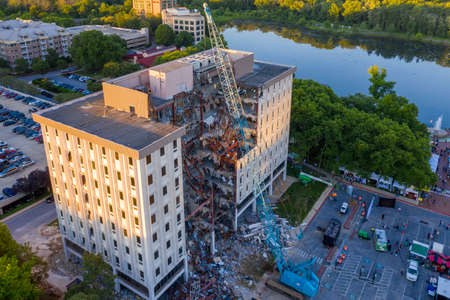 Aerial view of an office building under demolition by a wrecking ball in Columbia Town Center ...