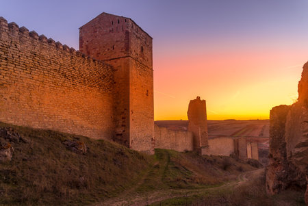 Molina de Aragon classic medieval Spanish ruined castle aerial panorama view at sunset close to Guadalajara Spainのeditorial素材