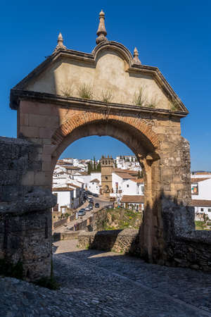 Ronda Spain aerial view of medieval hilltop town surrounded by walls and towers with famous bridge over gorgeのeditorial素材