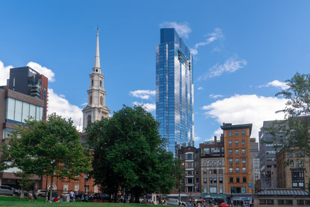 Boston commons old building with brick facade, church and glass window sky scraper New Englandのeditorial素材