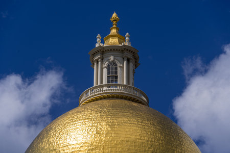 View of the Massachusetts State House with a golden dome in Boston on a sunny weekend summer afternoonのeditorial素材