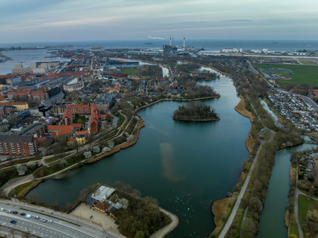 Aerial view of polygonal bastions and water filled moat protecting Copenhagen Christiania neighborhood during sunsetの写真素材