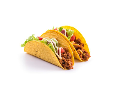Mexican tacos with meat and vegetables on white background. Isolatedの素材