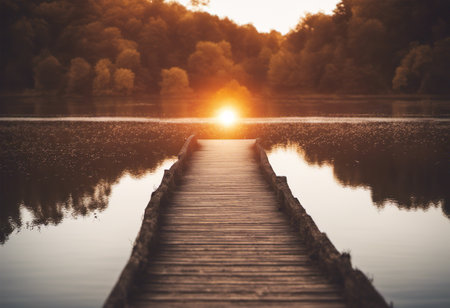 Wooden pier on the lake at sunrise. Beautiful summer landscape.の素材