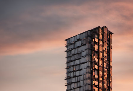 Modern office building at sunset, detail of a modern building in the cityの素材