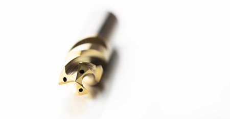 drill bits special tools three fluted. coating Titanium Nitride. Right spiral flute have oil hole. isolated On white background. Make holes part automotive.の写真素材