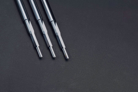 tools special drill reamer. Cutting edge straight flute. isolated on black background. Material carbide solid. Make holes metalwork.の写真素材