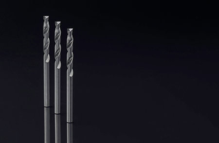 drill bits small. special cutting tools. Spiral right hand. material carbide. On black background. Make holes part metalwork.の写真素材