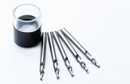 set drill bits small. special cutting tools. spiral right hand. isolated On white background. used metal work.の写真素材
