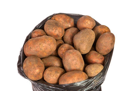 Raw potatoes in a packageの写真素材