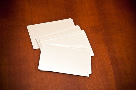 blank business card on a wooden backgroundの写真素材