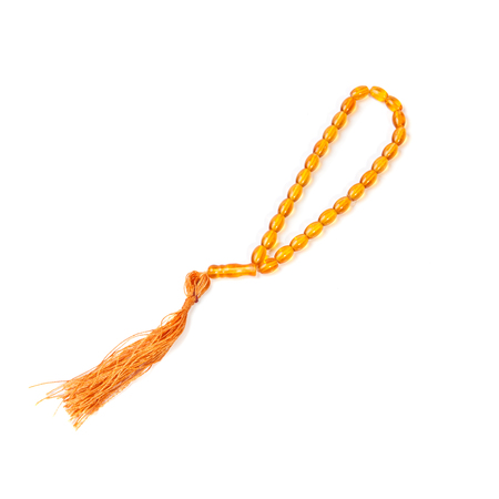 orange beads on a white backgroundの写真素材