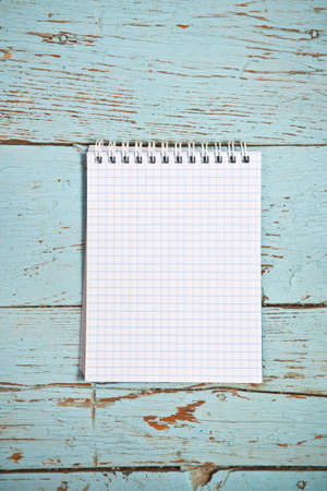 open notebook on a wooden backgroundの写真素材
