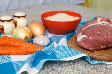 pilaf ingredients laid out on the kitchen tableの写真素材