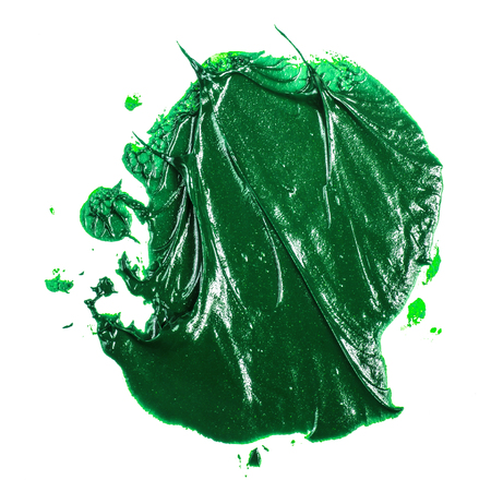 smear of green oil paint on a whiteの写真素材