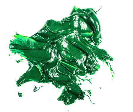 smear of green oil paint on a white