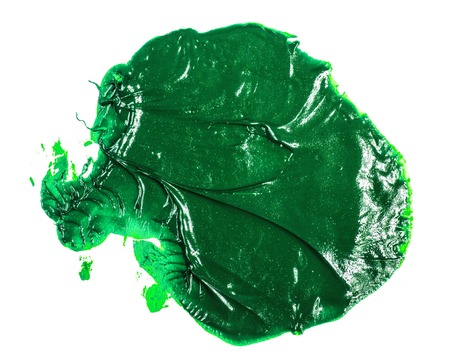 smear of green oil paint on a whiteの写真素材
