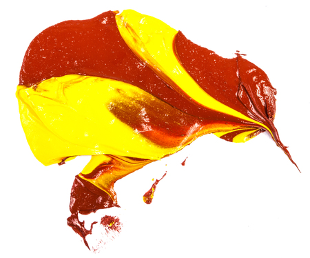 spot of yellow and red oil paint. smear on whiteの写真素材