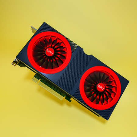 modern video card on a yellow background. three-dimensional computer background of the GPU. 3d...