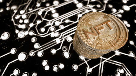 stack of three-dimensional silver coins with the inscription nft on a black background. crypto art concept. 3d render illustrationの写真素材