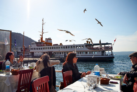 ISTANBUL, TURKEY - FEBRUARY 13, 2014: A fish restaurant on the waterfront at Kavagi, Bosphorus Strait, Istanbul, Turkey.のeditorial素材