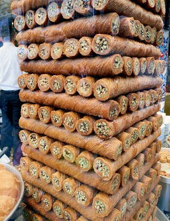 ISTANBUL, TURKEY - FEBRUARY 13, 2014: A pile of Baklava for sale in a shop window Istanbul,Turkey.のeditorial素材