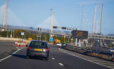 FORTH ROAD BRIDGE, SCOTLAND, UK - NOVEMBER 05, 2016: Traffic approaching the Forth Road Bridge with...