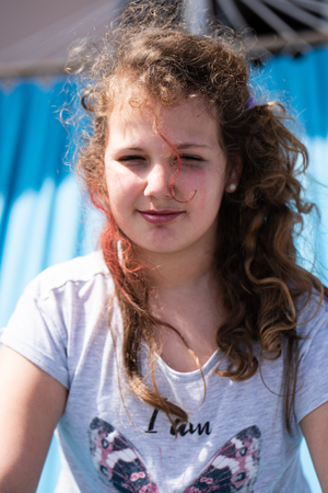 Girl plays on a hammockの写真素材