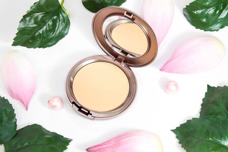 face powder with lotus flower on with backgroundの写真素材