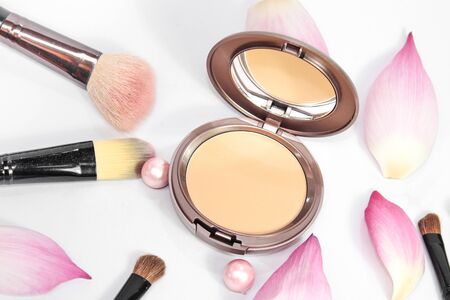 face powder with lotus flower on with backgroundの写真素材