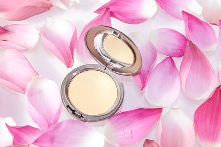 face powder with lotus flower on with backgroundの写真素材