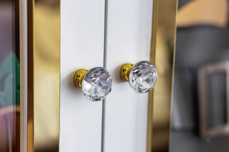 Close-up of the room's white wood cabinetsの写真素材