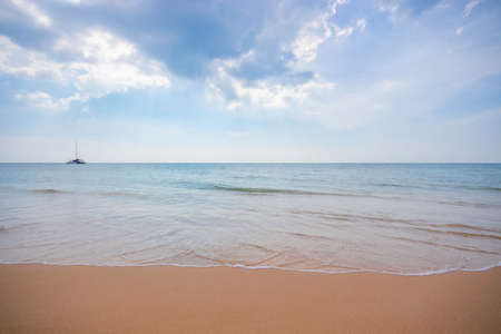 Smooth orange beach And the blue seaの写真素材