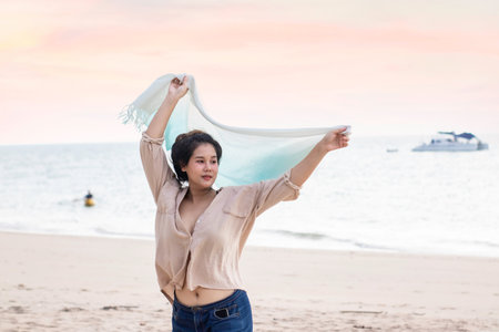 Woman resting and having fun at the beachの写真素材