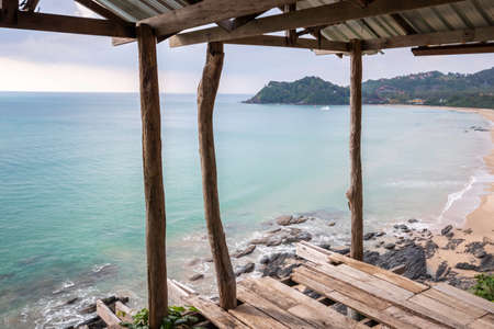 Abandoned house on the edge of the cliff overlooking the sea.の写真素材