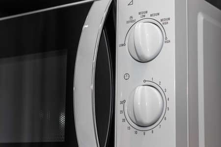 Control panel of white microwaveの写真素材