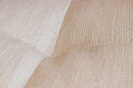 Close Up texture of orange fabric sofa backgroundsの写真素材