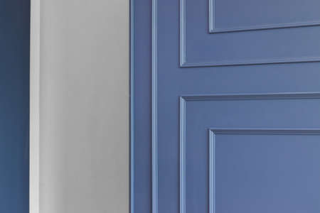 Close-up of blue stenciled wood wall in house.の写真素材