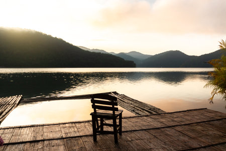sunrise and sunset at the mountain range in the lakeの写真素材