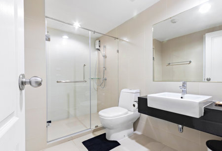 white clean bathroom in modern condominiumの写真素材