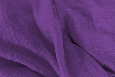 close-up of purple colorful fabric surfacesの写真素材