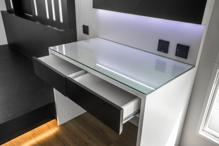 Bedside desk in modern bedroom in blackの写真素材