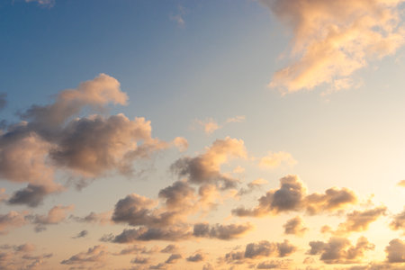 Orange evening sky on a calm beachの写真素材