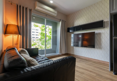 black sofa and tv in living room interior designの写真素材